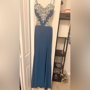 La Femme Vibrant Blue Gown with Gold Embellishments